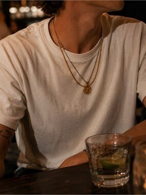Four piece gold plated and silver necklace and bracelet set